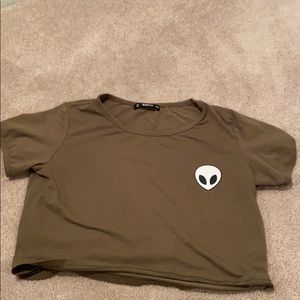 Green crop top and an alien on the front